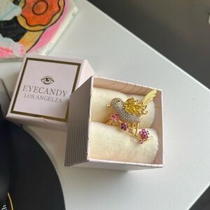 Ornate Gold and Pink Ring with Bird Motif